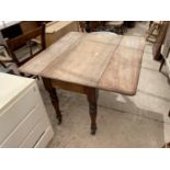 A VICTORIAN MAHOGANY PEMBROKE TABLE ON TURNED LEGS