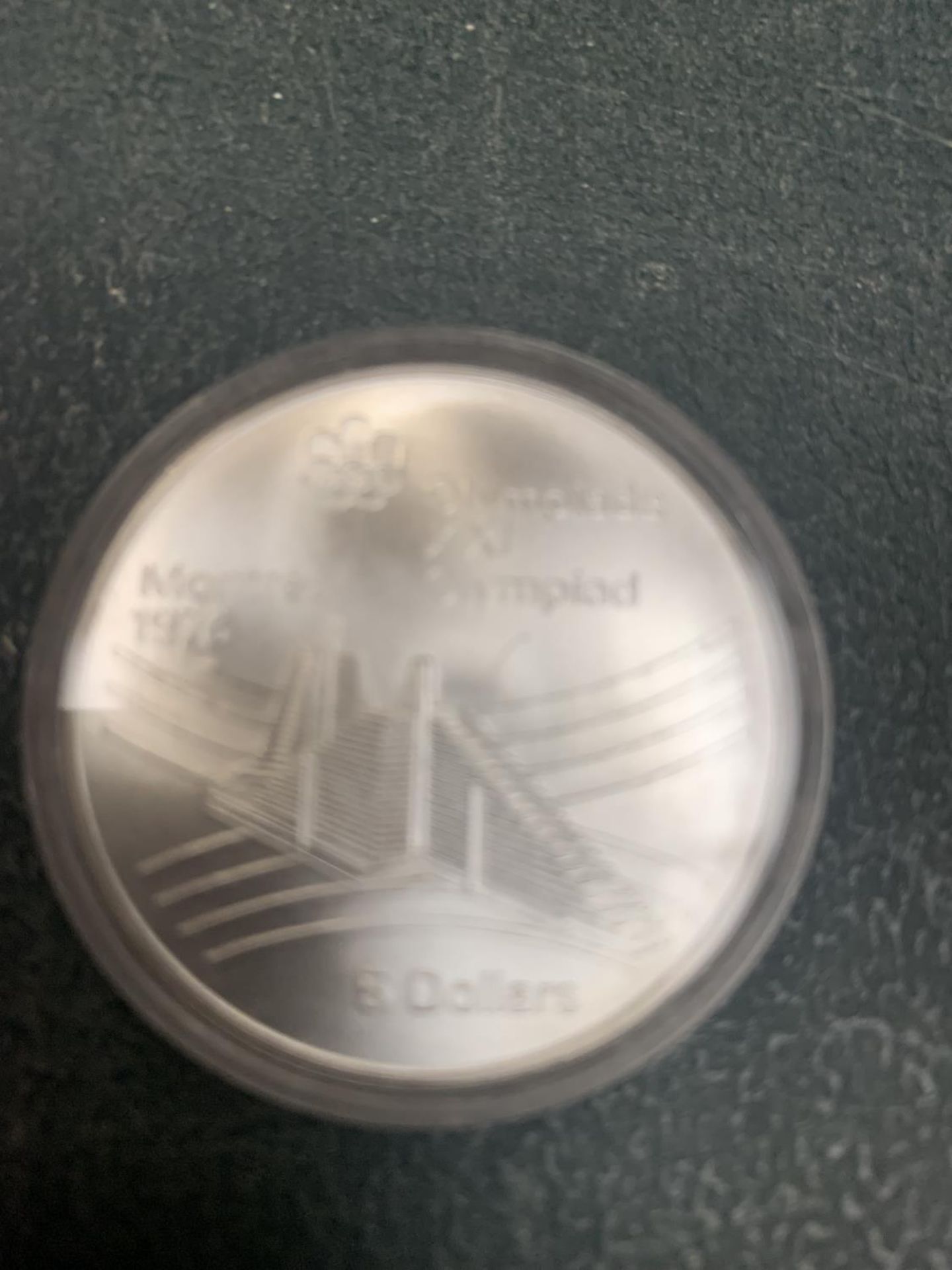 A 1976 MONTREAL OLYMPICS SILVER 5 DOLLAR