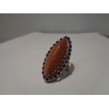 AN ANTIQUE GOLD STONE AND SYNTHETIC SAPPHIRE RING SIZE N