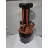 A LARGE MIDDLE EASTERN, POSSIBLY TURKISH, POTTERY TRI HANDLDED WINE VESSEL, HEIGHT 39 CM