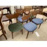 A SET OF FIVE MID 20TH CENTURY STYLE DINING CHAIRS WITH WHALE FIN BACKS