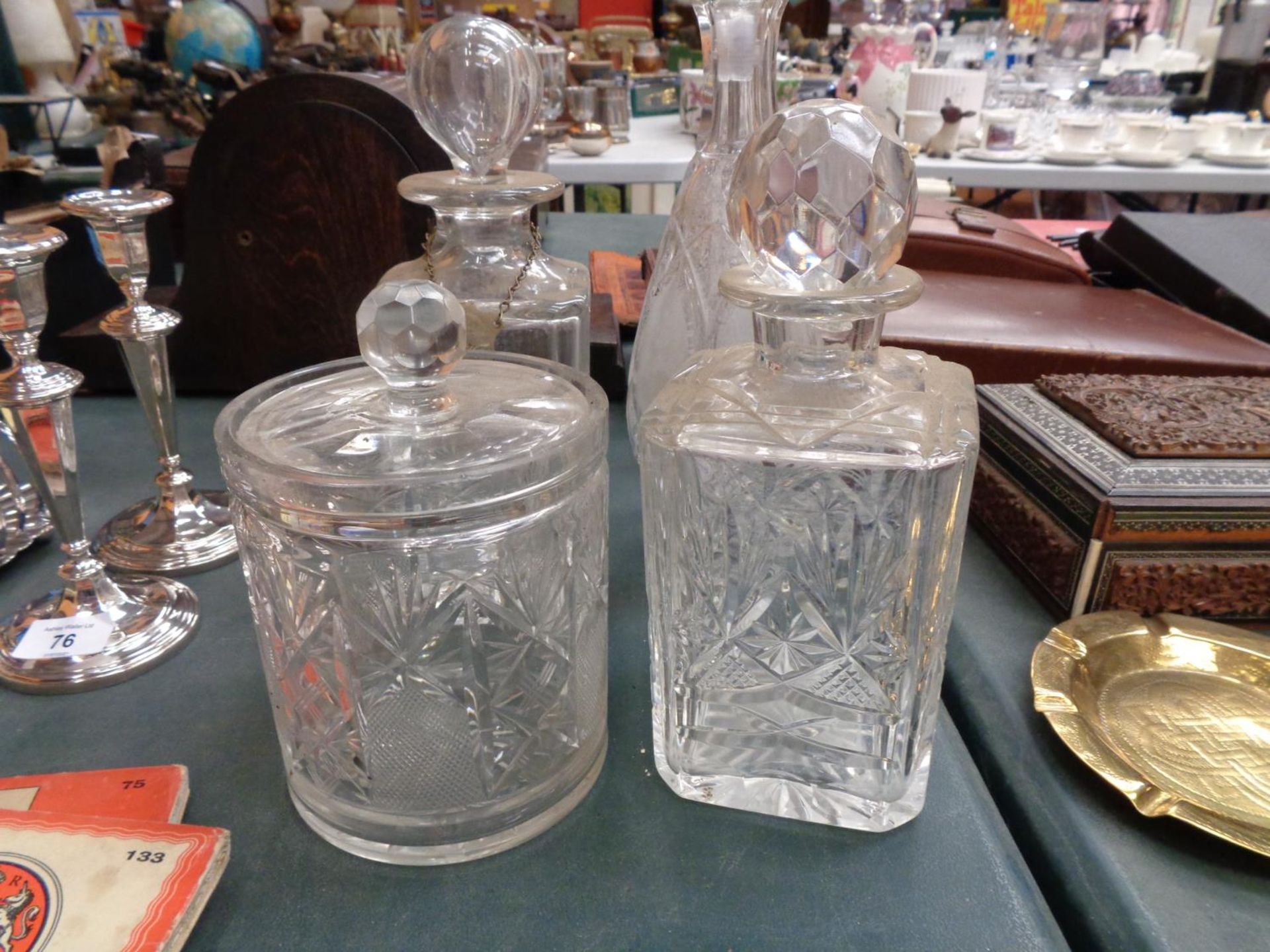 FOUR CUT GLASS DECANTERS ONE WITH LABEL - Image 2 of 3