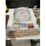 AN ASSORTMENT OF DRUM RELATED ITEMS TO INCLUDE DRUM STICKS AND SKINS ETC