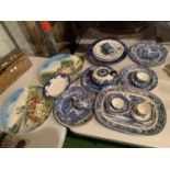 A SELECTION OF BLUE AND WHITE CERAMICS TO ALSO INCLUDE TWO LARGE DECORATIVE SCENERY PLATES
