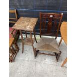 AN EDWARDIAN ROCKING CHAIR AND OAK EDWARDIAN TWO TIER JARDINIER STAND