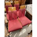 A SET OF FOUR 1970'S DINING CHAIRS WITH UPHOLSTERED SEATS AND BACKS