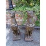 TWO LARGE RESIN TYPE DOG STATUES