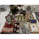 A COLLECTION OF ITEMS TO INCLUDE FLATWARE, PHOTOGRAPH FRAMES, GLASSES, LAMP, SILVER PLATE ETC