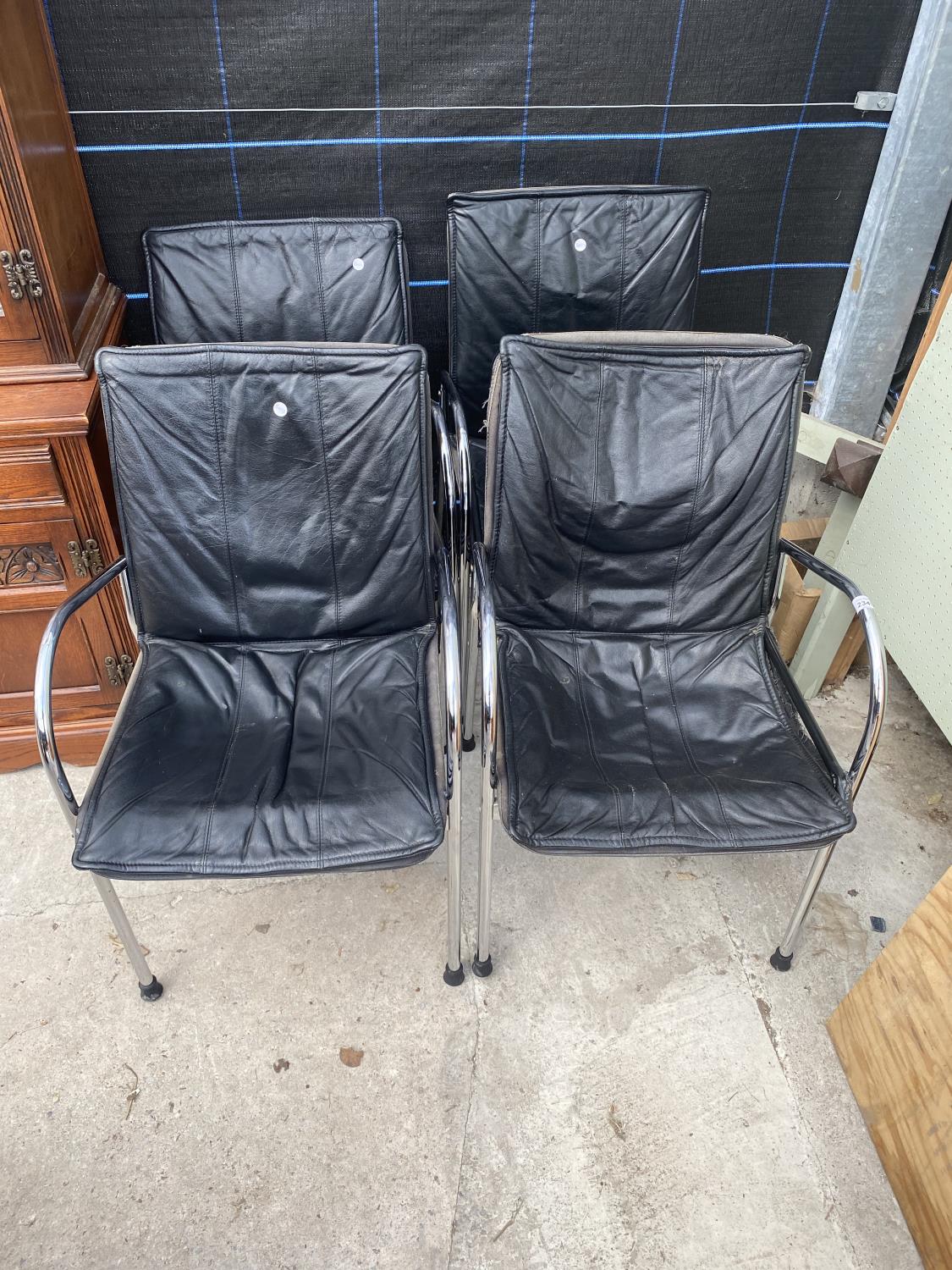 FOUR RETRO TUBULAR CHORMIUM PLATED ELBOW CHAIRS WITH FAUX BLACK LEATHER BACKS AND SEATS