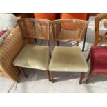 A PAIR OF RETRO TEAK POSSIBLY DANISH DESIGN DINING CHAIRS WITH SPLIT CANE BACKS