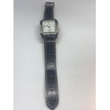 A LOUIS VALENTIN WRIST WATCH WITH BLACK LEATHER STRAP SEEN WORKING BUT NO WARRANTY