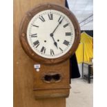 A DECORATIVE WOODEN WALL CLOCK