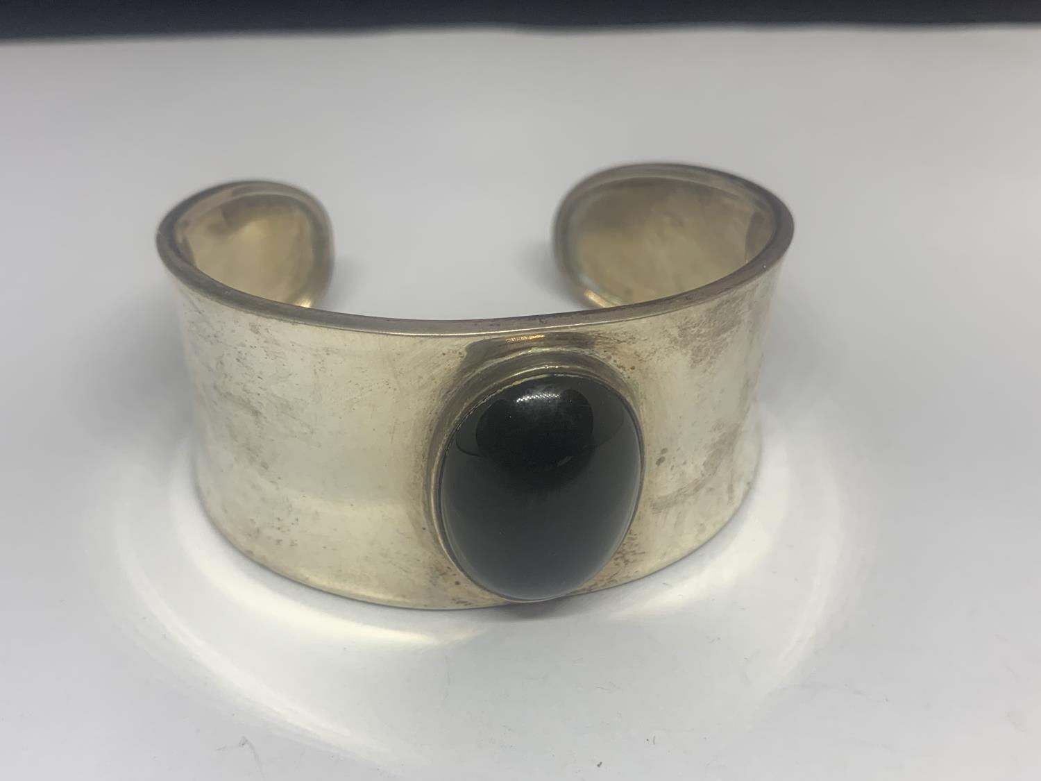 TWO HEAVY SILVER BANGLES WITH BLACK STONES - Image 2 of 3