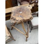 A RUSTIC ROOT AND BRANCH TABLE