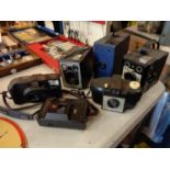 A COLLECTION OF SIX VINTAGE CAMERAS TO INCLUDE A BROWNIE SIX-20 MODEL D AND AN ENSIGN E29