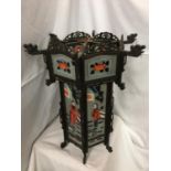 A HIGHLY DECORATIVE HAND PAINTED GLASS ORIENTAL LANTERN WITH CARVED HARDWOOD H 60CM, W 51CM