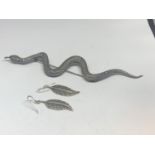 A SILVER SNAKE BROOCH AND A PAIR OF SILVER EARRINGS