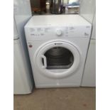 A WHITE HOTPOINT TUMBLE DRYER BELIEVED IN WORKING ORDER BUT NO WARRANTY