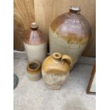 A COLLECTION OF STONE WARE VESSELS TO INCLUDE A LARGE FLAGON