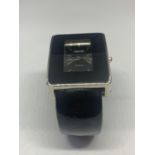 A TERNER QUARTZ BANGLE STYLE WRIST WATCH SEEN WORKING BUT NO WARRANTY