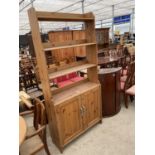 A MODERN PINE BOOKCASE ON BASE, 36.5" WIDE