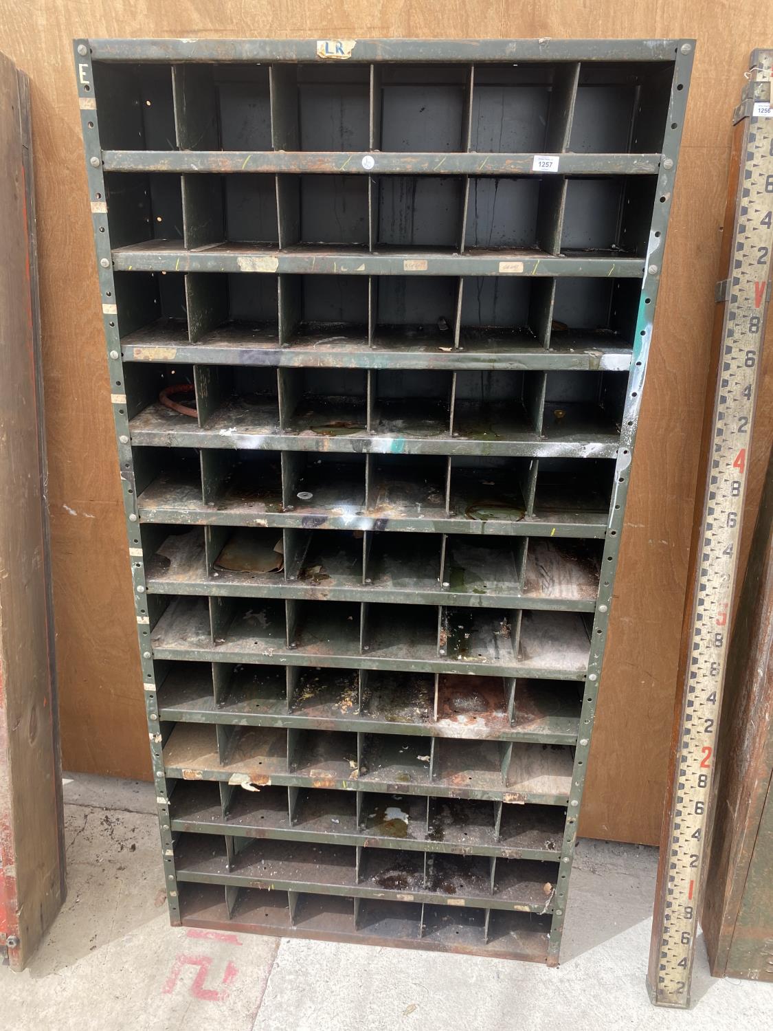 A VINTAGE 72 SECTION PIGEON HOLE STORAGE UNIT