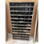 A VINTAGE 72 SECTION PIGEON HOLE STORAGE UNIT