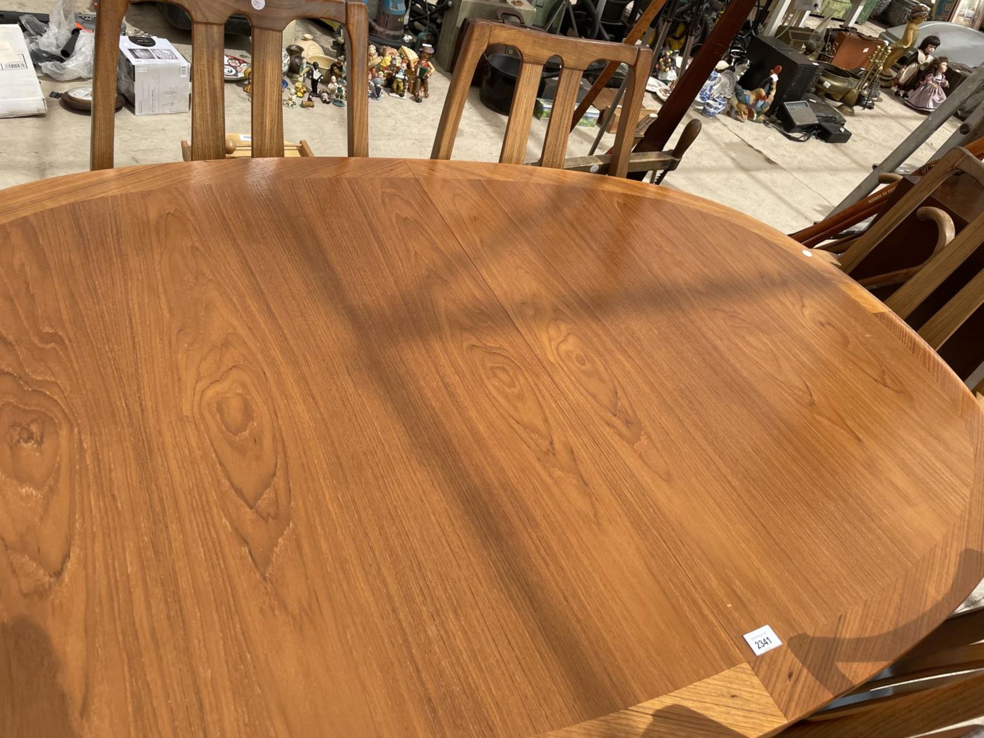 A NATHAN RETRO TEAK EXTENDING DINING TABLE WITH FOUR DINING CHAIRS AND TWO CARVERS - Image 2 of 9