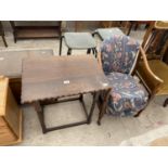 AN EARLY 20TH CENTURY OAK BARLEYTWIST CENTRE TABLE, 24X17" AND LOW NURSING CHAIR