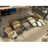A LARGE ASSORTMENT OF PICTURE FRAMES