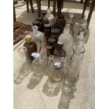 AN ASSORTMENT OF SCIENCE LAB BOTTLES AND JARS