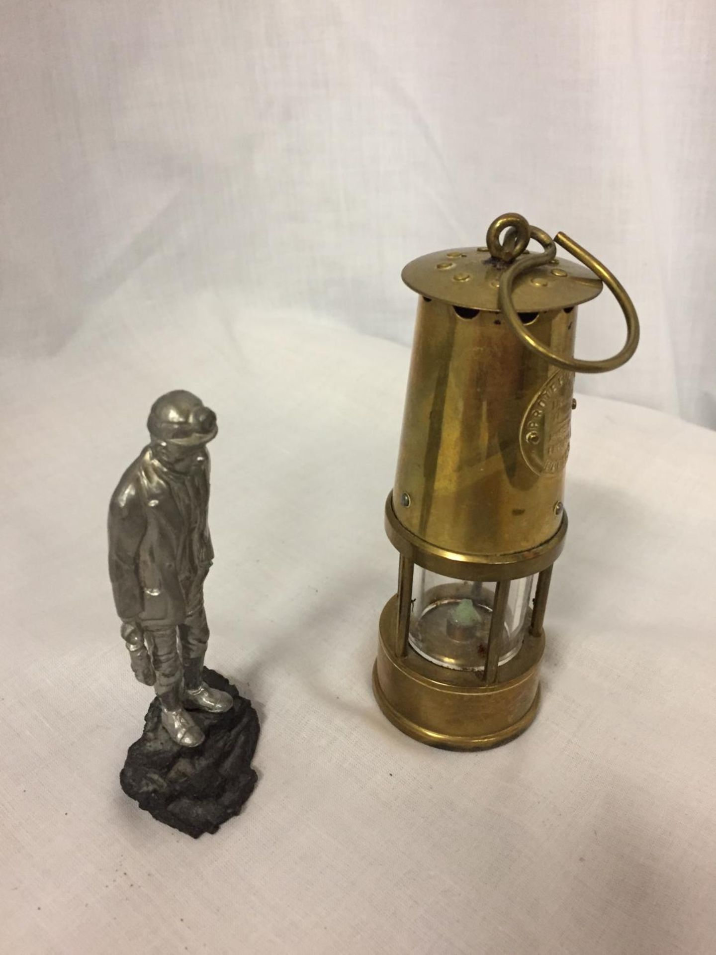A BRASS MINATURE MINERS PROTECTION LAMP ECCLES AND A FIGURE OF A MINER - Image 3 of 3