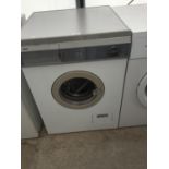 A WHITE ZANUSSI WASHING MACHINE BELIEVED WORKING ORDER BUT NO WARRANTY