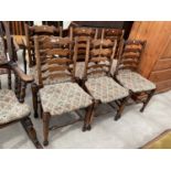 A SET OF SIX 18TH CENTURY STYLE LADDERBACK DINING CHAIRS WITH RUSH SEATS