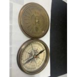 A BRASS CALENDER COMPASS