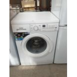 A WHITE SIEMENS WASHING MACHINE BELIEVED IN WORKING ORDER BUT NO WARRANTY