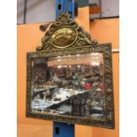 AN ORNATE FRAMED MIRROR 14" X 17"