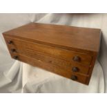 A WOODEN SMALL THREE DRAWER CHEST W:51CM H:28CM
