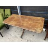 A 19TH CENTURY STYLE MAHOGANY TABLE ON QUATREFOIL BASE, 54X25"