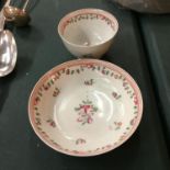 AN 18TH/19TH CENTURY POSSIBLY NEW HALL PORCELAIN TEA BOWL AND SAUCER