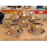 A SAMURAI CHINA HANDPAINTED TEA SET TO INCLUDE TEA POT, MILK JUG, SUGAR BOWL AND FIVE CUPS AND