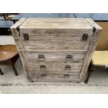 A MODERN CHEST OF THREE DRAWERS WITH FLOORBOARD EFFECT FINISH WITH LIFT-UP TOP SECTION, 39" WIDE