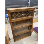 A MODERN OAK GLAZED AND LEADED GLOBE WERNICKE STYLE FOUR TIER BOOKCASE, 36" WIDE