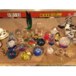 A COLLECTION OF TWENTY ONE GLASS PAPER WEIGHTS