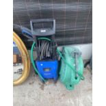 A NILFISK PRESSURE WASHER AND A HOSE REEL