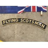 A CAST METAL FLYING SCOTSMAN SIGN