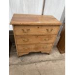 A SMALL OAK GEORGIAN STYLE CHEST OF THREE GRADUATED DRAWERS, 30" WIDE, WITH BRASS HANDLES