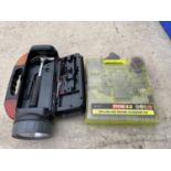A RYOBI DRILLING AND DRIVING ACCESSORY KIT AND A TORCH ENCLOSING A TOOL BOX SECTION