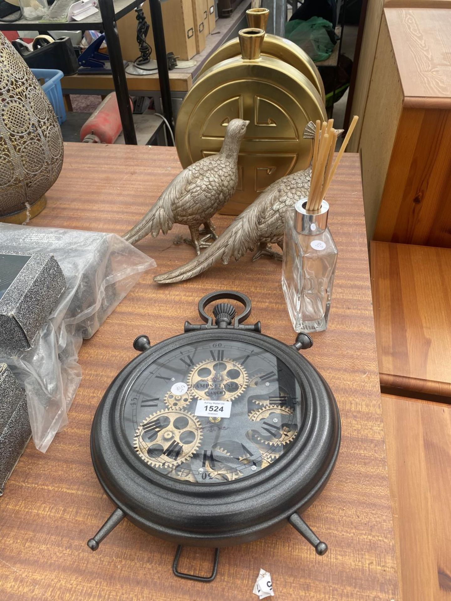 AN ASSORTMENT OF ITEMS TO INCLUDE A CLOCK IN THE FORM OF A POCKET WATCH, VASES AND A PAIR OF