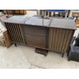 A RETRO VALENCIA DELUXE STEREO CABINET SIDEBOARD WITH TWO SPEAKERS ENCLOSING A GARRARD RECORD